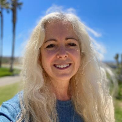 Photograph of Cynthia Becht smiling at the camera